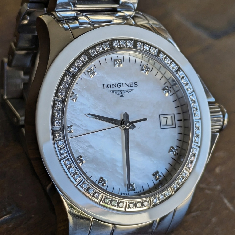 Longines Conquest L3.281.0 Mother of Pearl Dial Diamond Ceramic Bezel 35mm